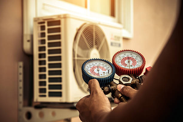 Professional Hvac technician working in Thompson, OH